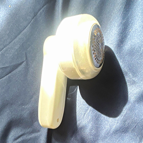 White manual handheld lint - handheld,